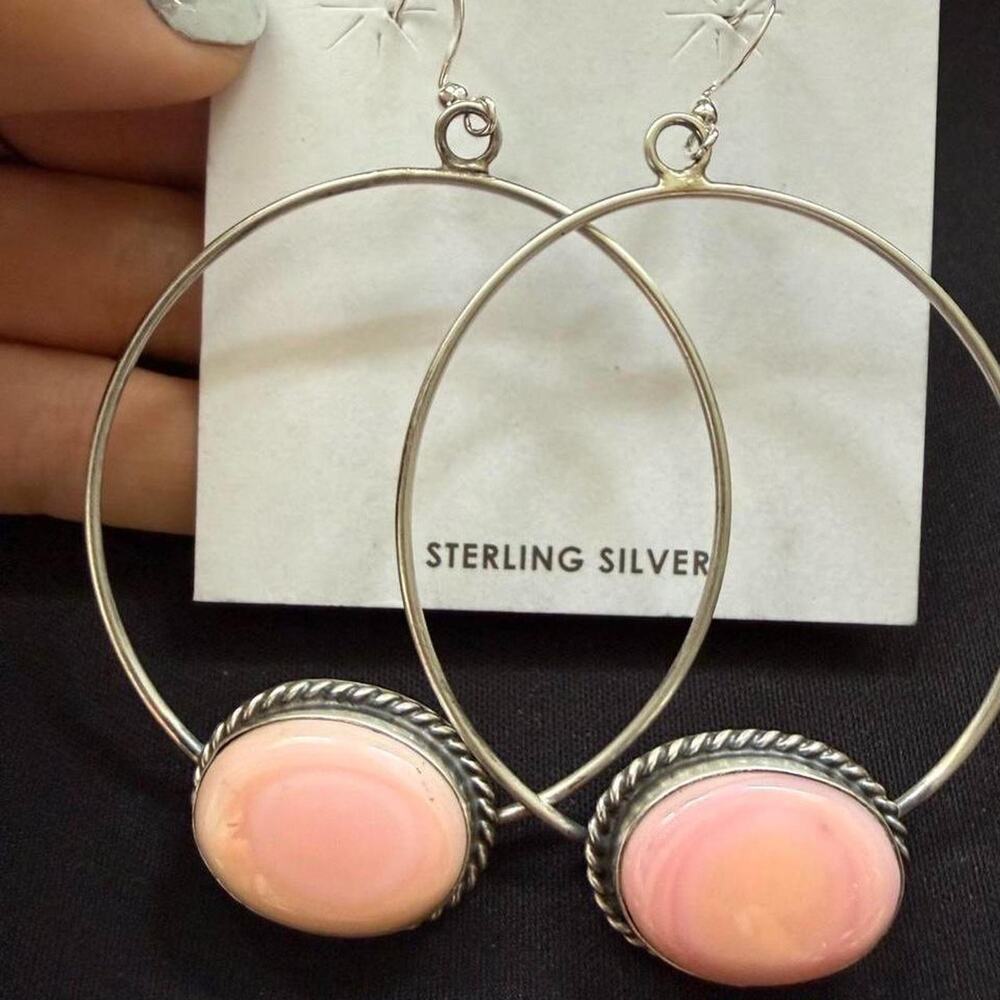 Big beautiful native handmade pink conch hoop earrings. Sterling silver